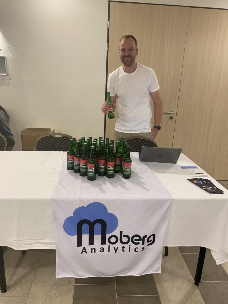 Tobias Hamann with Moberg Analytics' Brain Tsunami beer