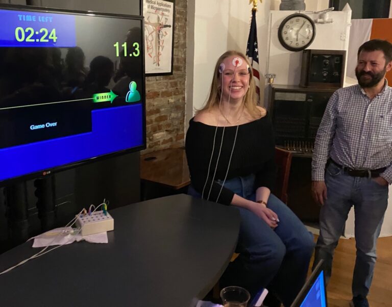 Meghan Wilner and Ilya Livshits at the Moberg Analytics Intergalactic Headquarters, playing Brain Ball