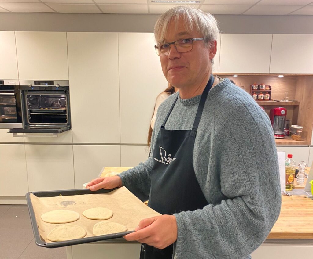 Dr. Jens Dreier heading to the oven with his newly formed pita. SOPRANI