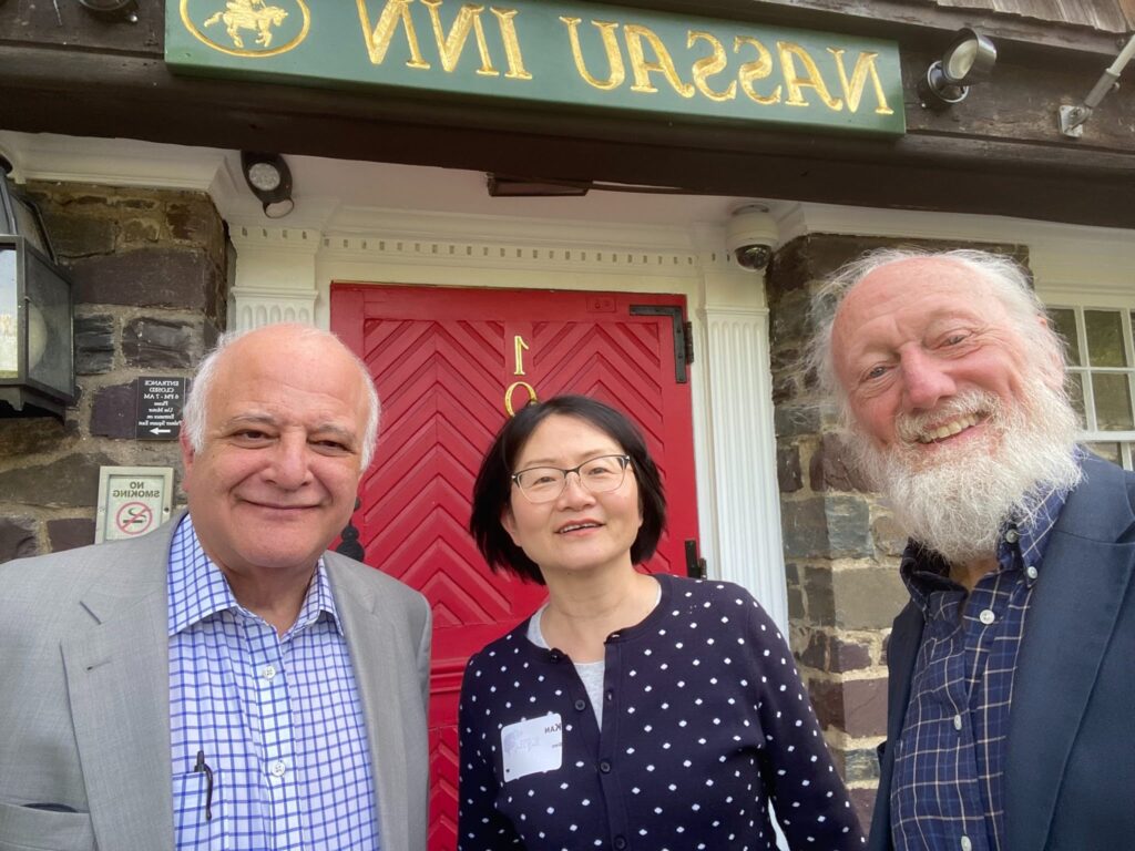 may 2026 recap: Ramon Diaz-Arrastia MD PhD and Kan Ding MD in front of the Nassau Inn.
